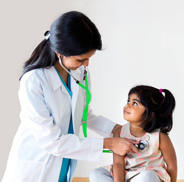 Pediatric doctor examining child with stethoscope at Kaiwalya Hospital Indore