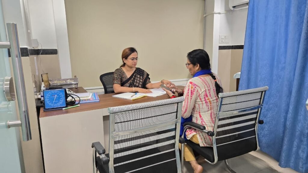 Doctor consulting a patient at the best hospital in Khandwa Road Indore during an OPD visit.